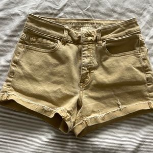 AE super stretch gold/tan jean shorts